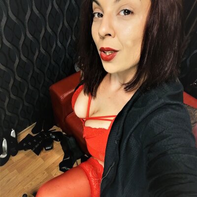 LeatherDomGia naked stripping on cam for live sex video chat