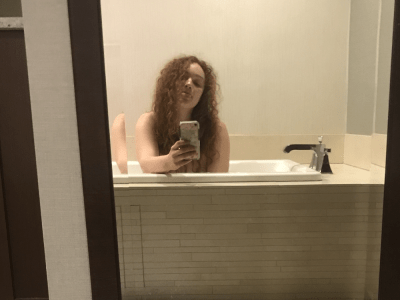 RedHeadZoe naked stripping on cam for live sex video chat