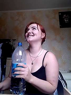 RedheadJane naked stripping on cam for live sex video chat