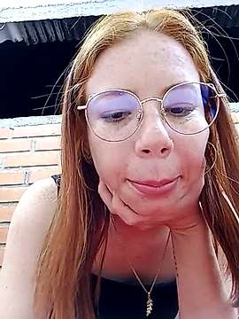 redheaddoll22 naked stripping on cam for live sex video chat